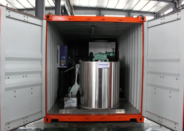 Containerized flake ice machine evaporator